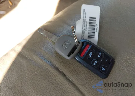 2009 Honda Odyssey Ex-L from USA, damaged, VIN 5FNRL387X9B038710